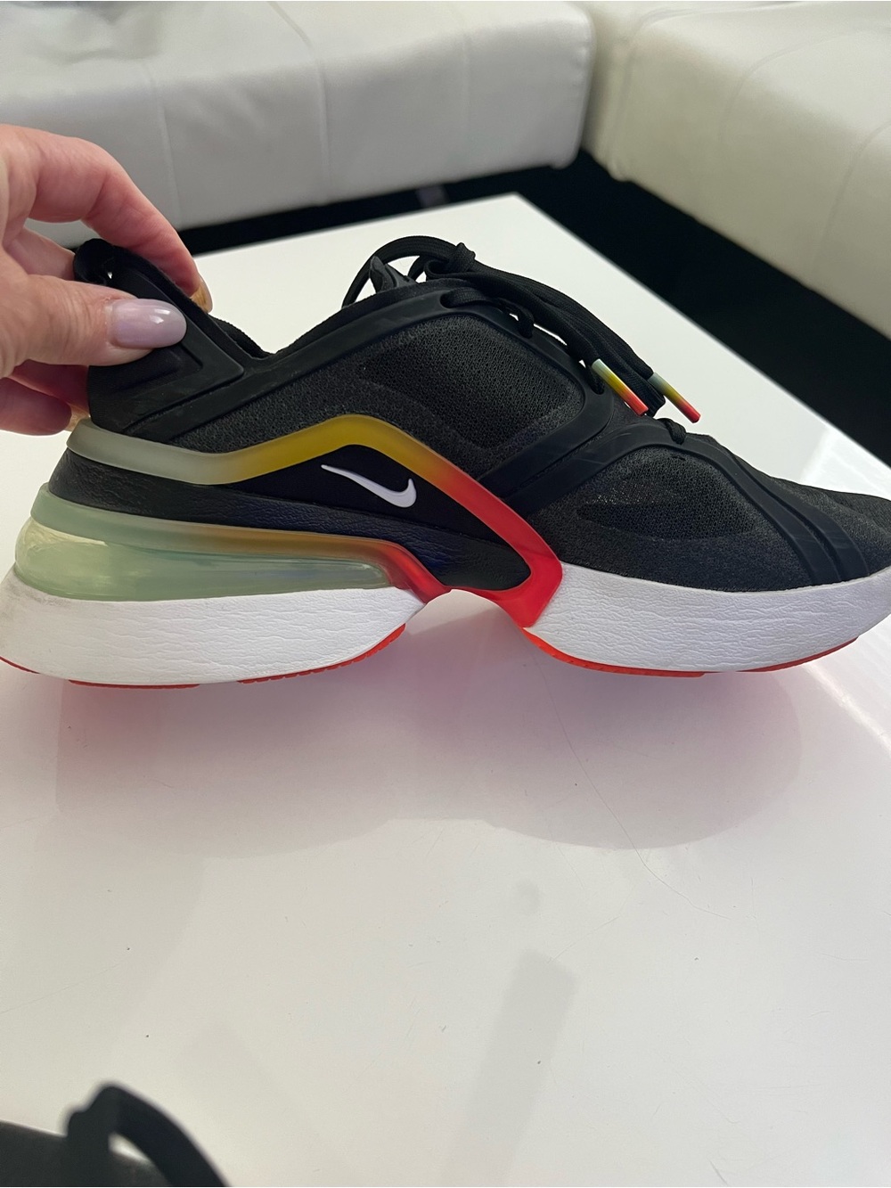 Nike Women’s Rare Sneakers Black with Red and Yellow Accents